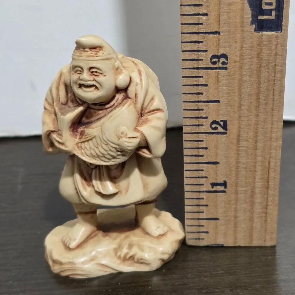 Vtg Asian Japanese Carving Old Man with Fish Cast Fesin Faux Ivory